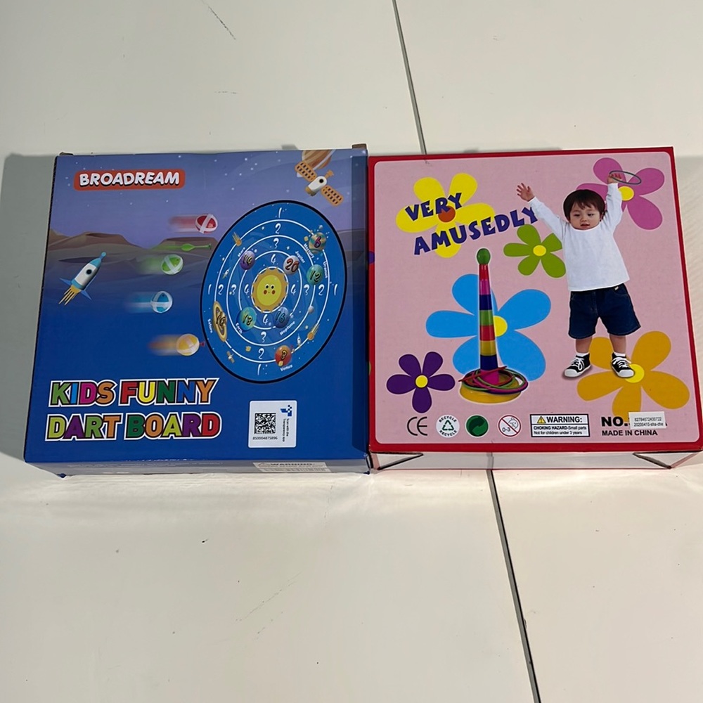 Kids games, dart board and ring toss.